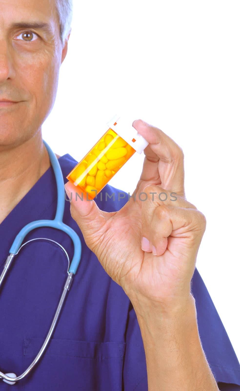 Close up of Doctor holding prescription bottle isolated on white Focus on pills