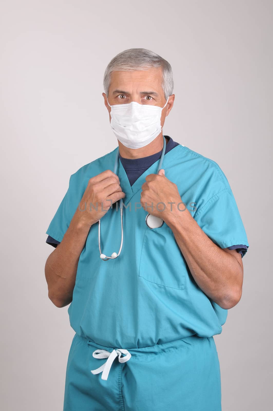 Doctor in Scrubs and Mask with Stethoscope by sCukrov