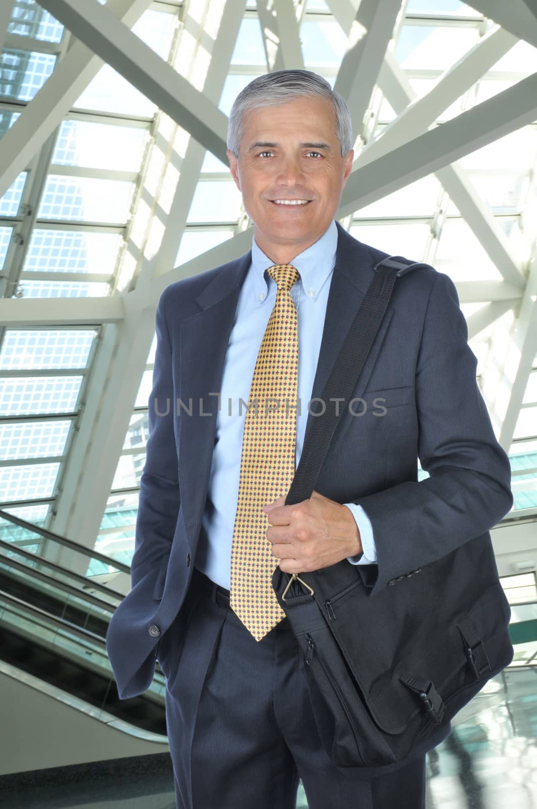 Middle aged Businessman with Shoulder Bag by sCukrov
