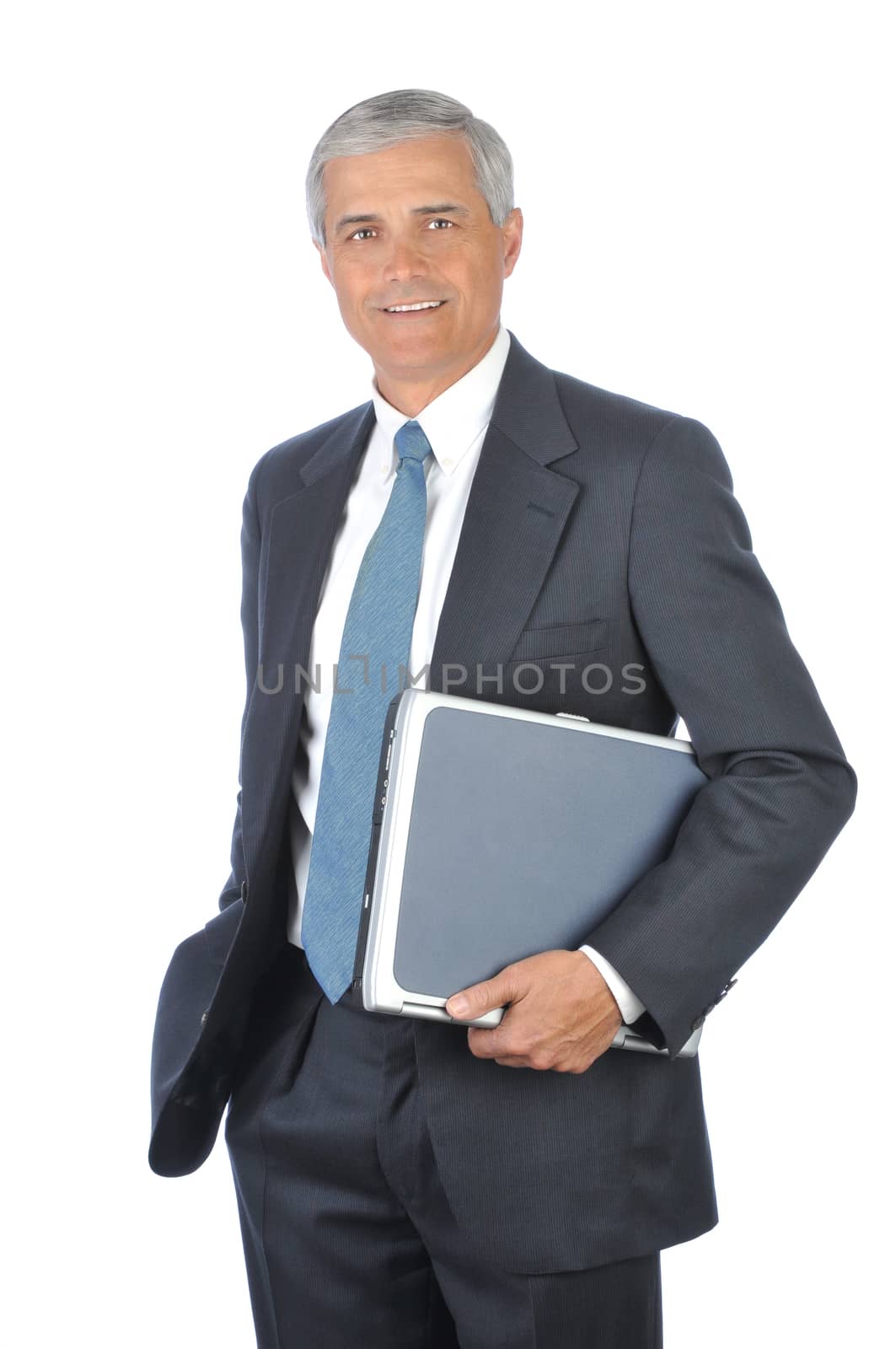 Smiling Businessman Holding Laptop Computer Under His Arm isolaed on white
