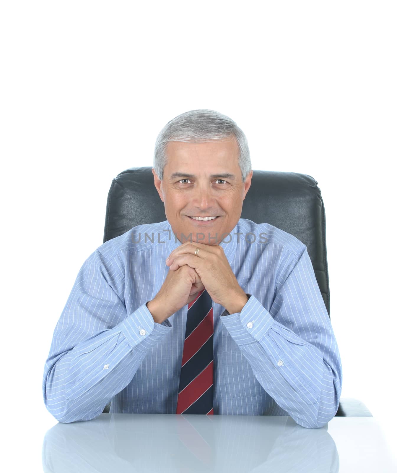 Businessman seated a desk by sCukrov