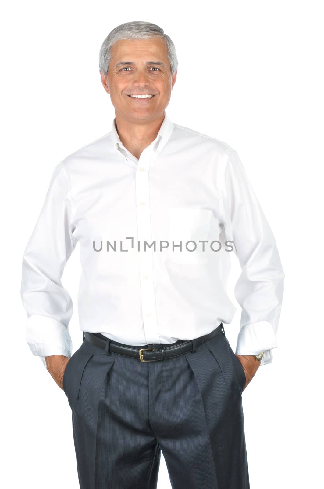 Smiling Mature Businessman With hands in Pockets no tie sleeves rolled up isolated on white