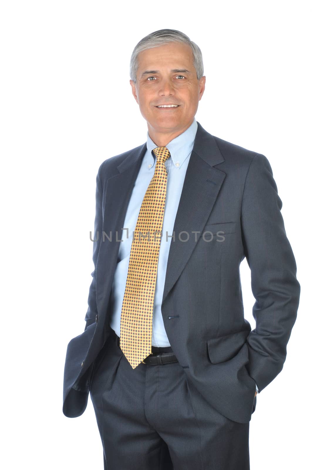 Standing Businessman with hands in pockets isolated on white