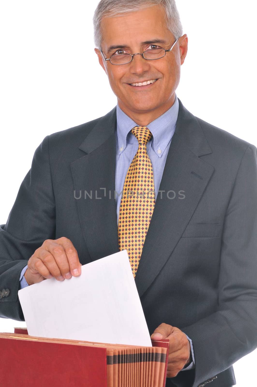 Smiling Businessman Putting Papers in File Box isolated on white