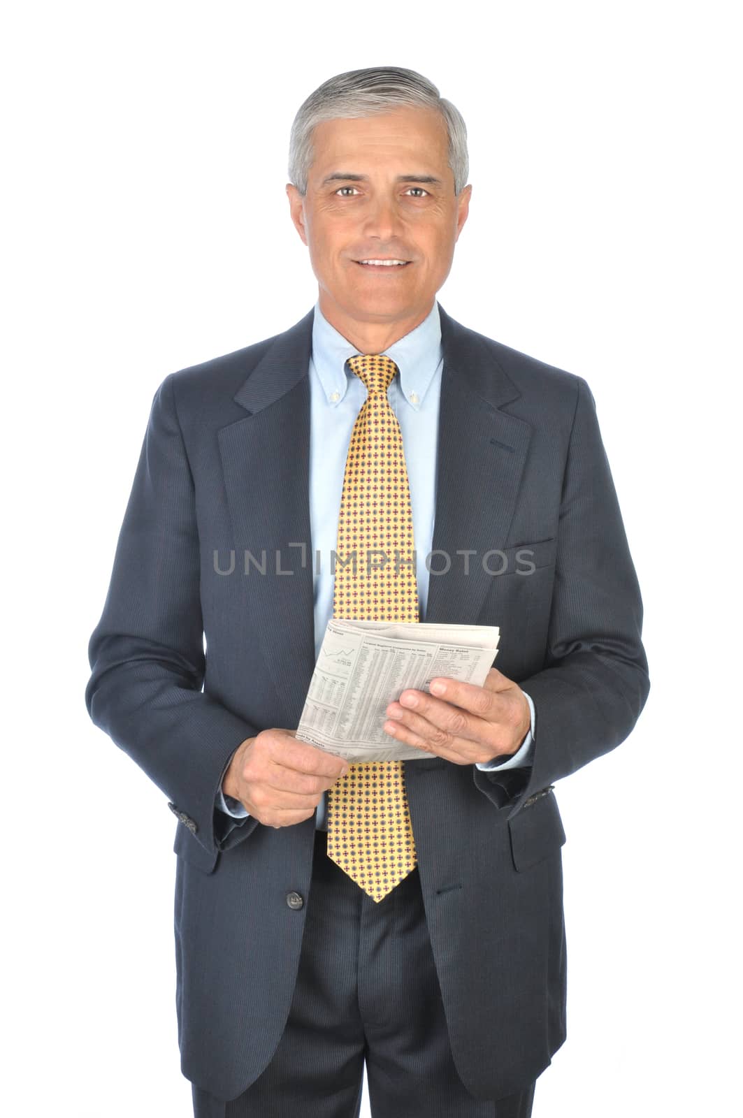 Standing Businessman with Financial Section of Newspaper isolated on white