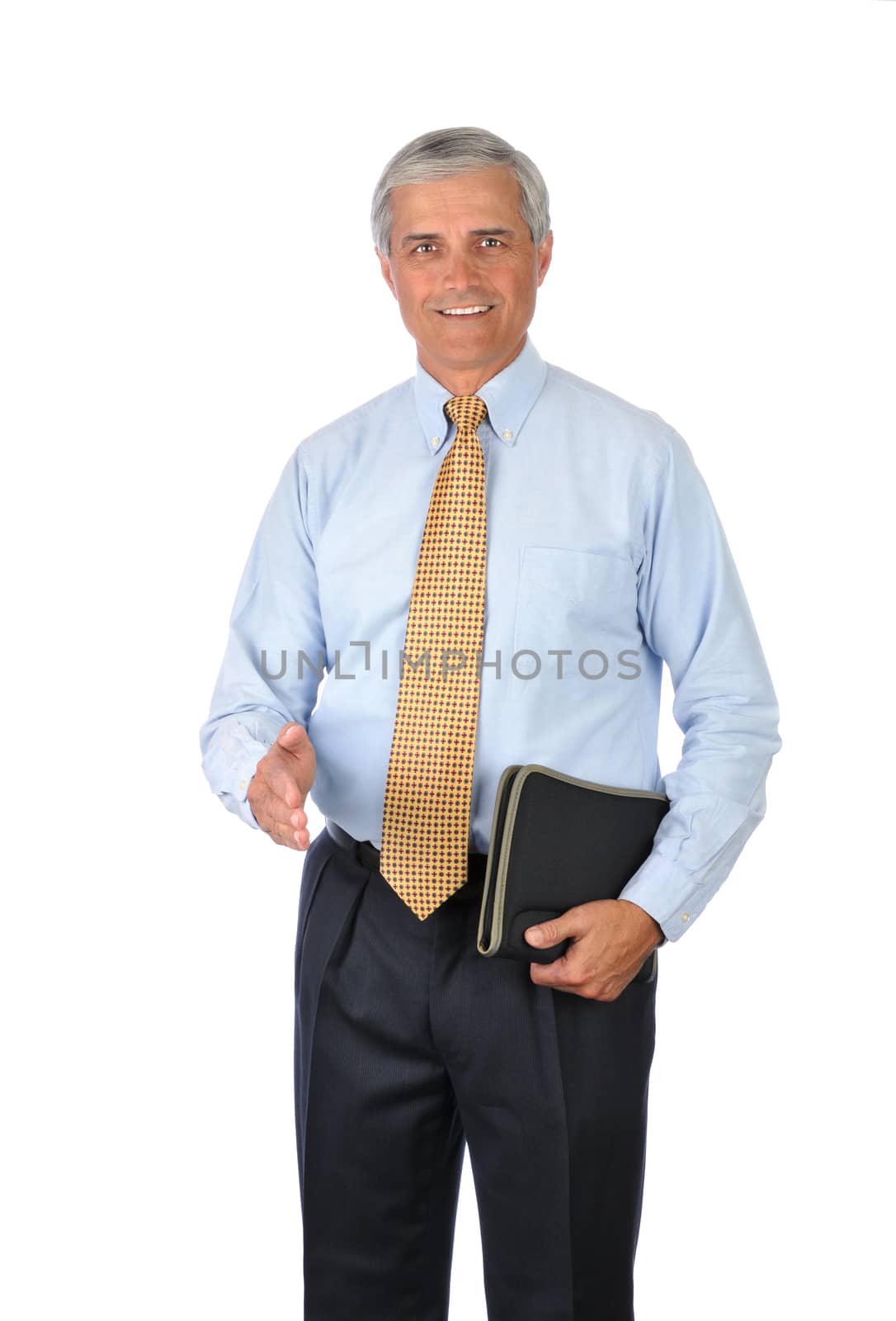 Businessman with notebook and hand extended to shake by sCukrov