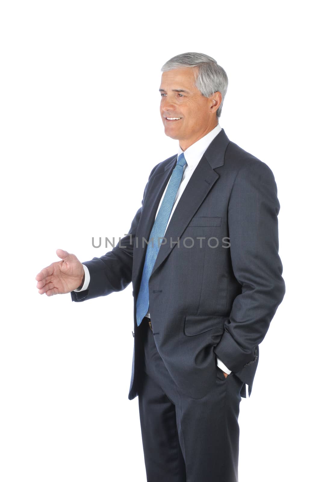 Standing Businessman with hand extended to shake isolated on white