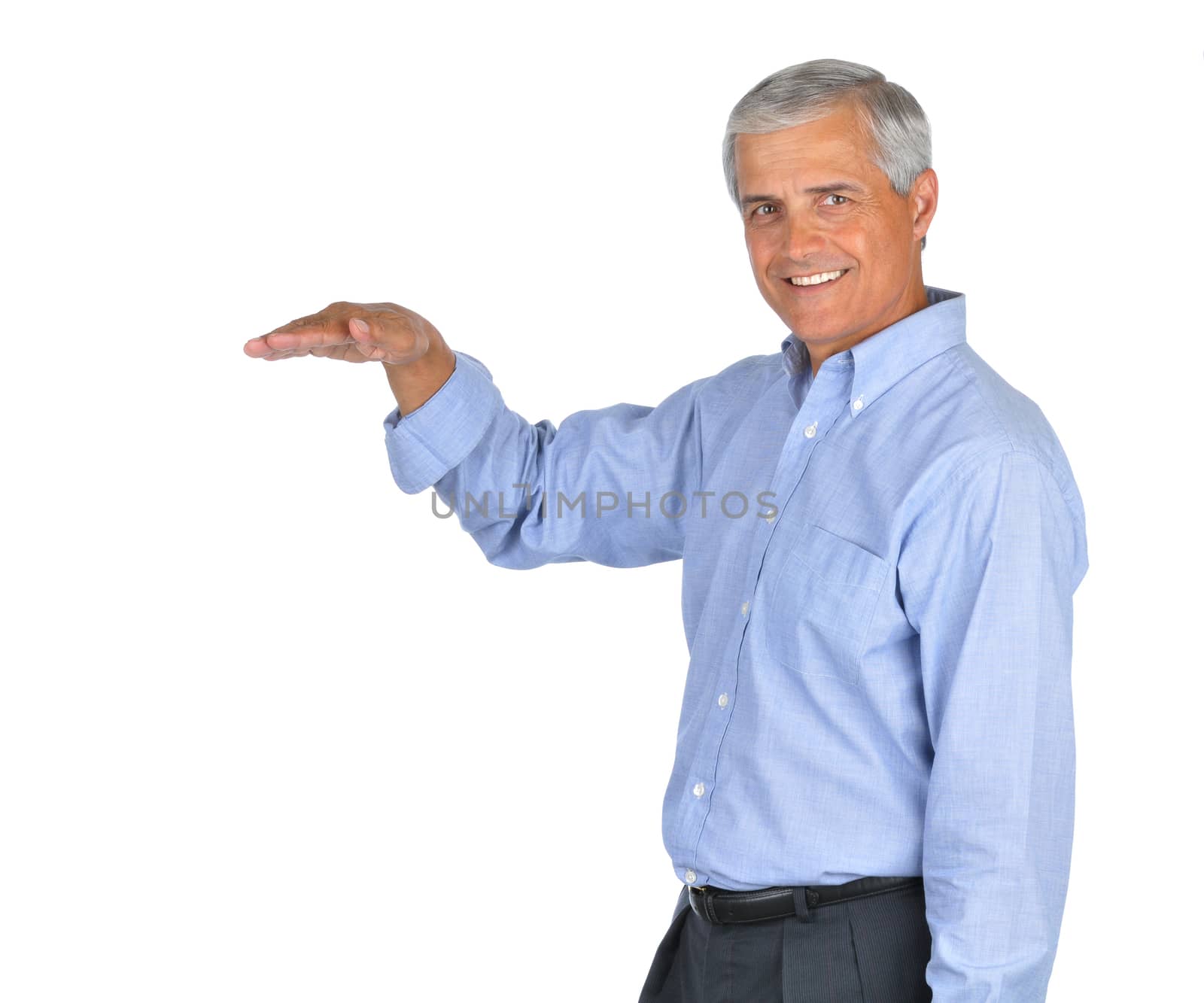 Businessman with arm extended palm down isolated on white