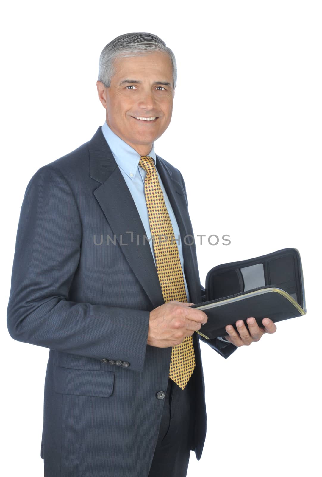 Standing Middle aged Businessman with Planner Notebook isolated on white
