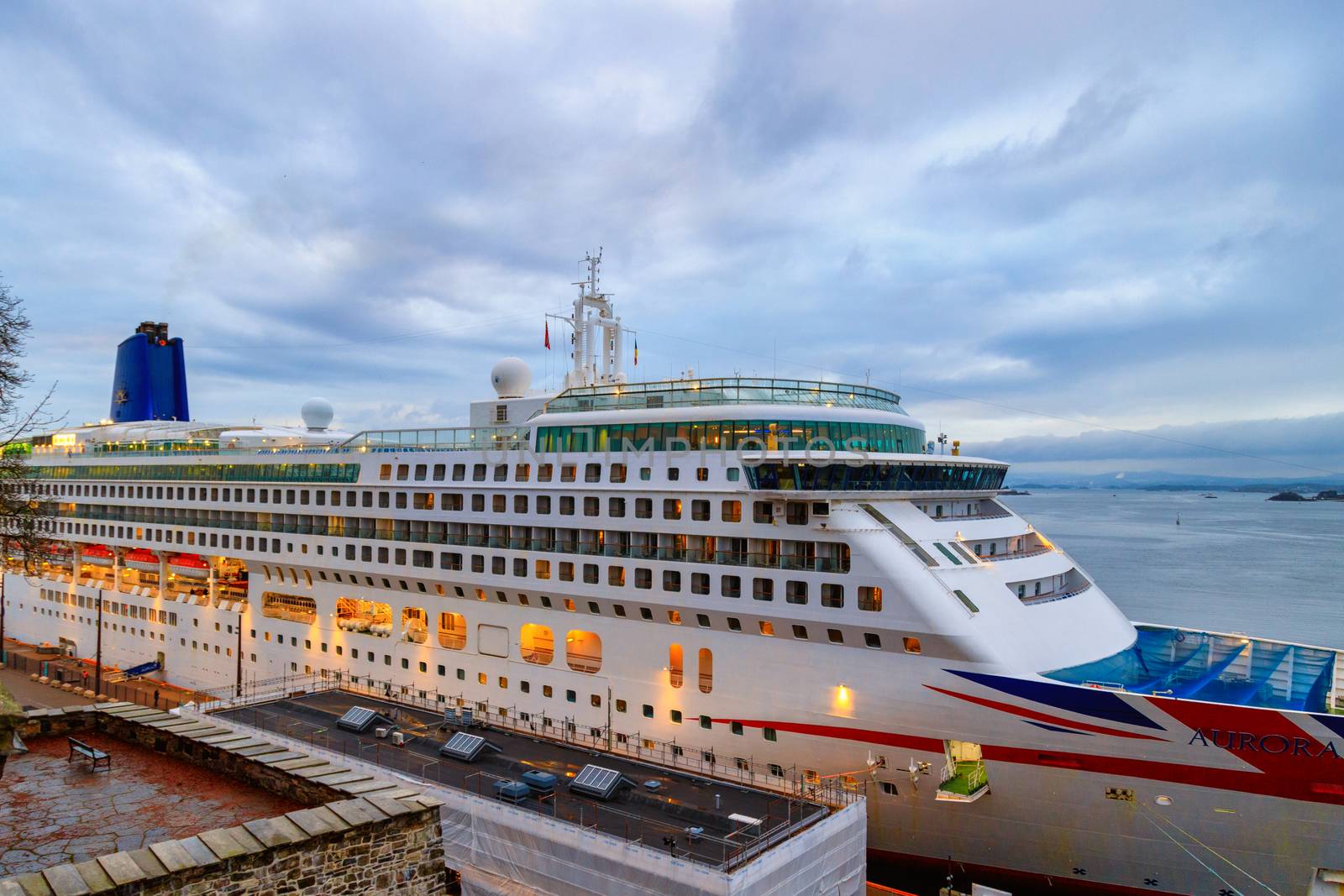 Norway, Oslo, CIRCA 2020: MV Aurora cruise ship of the P&O Cruises fleet docked in harbor due to covid19 restrictions. Concept of cruise ship losing money due to coronavirus pandemic