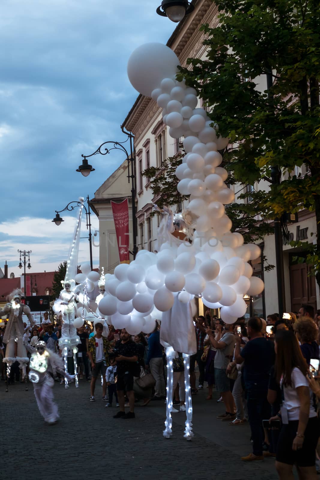 Sibiu City, Romania - 20 June 2019. Mademoiselle Paillette perform White World show in night at the Sibiu International Theatre Festival from Sibiu, Romania.