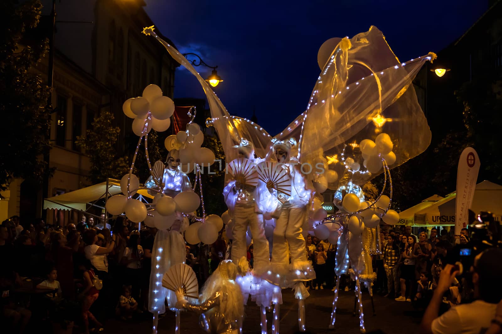Sibiu City, Romania - 20 June 2019. Mademoiselle Paillette perform White World show in night at the Sibiu International Theatre Festival from Sibiu, Romania.
