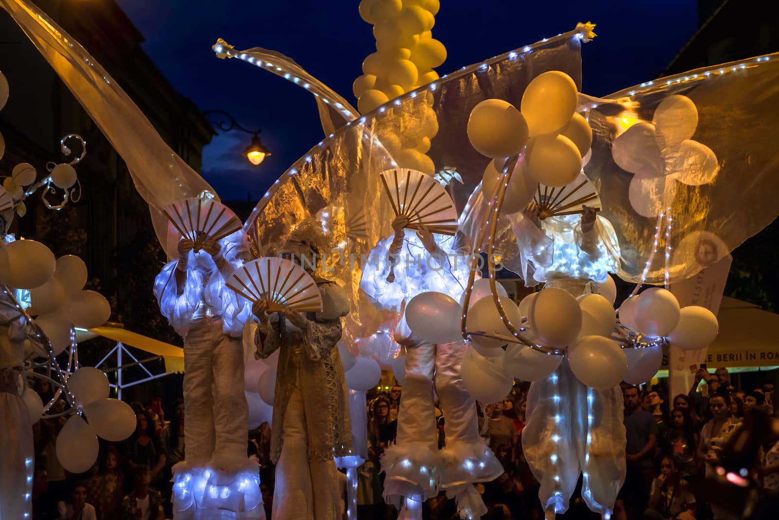 Sibiu City, Romania - 20 June 2019. Mademoiselle Paillette perform White World show in night at the Sibiu International Theatre Festival from Sibiu, Romania.