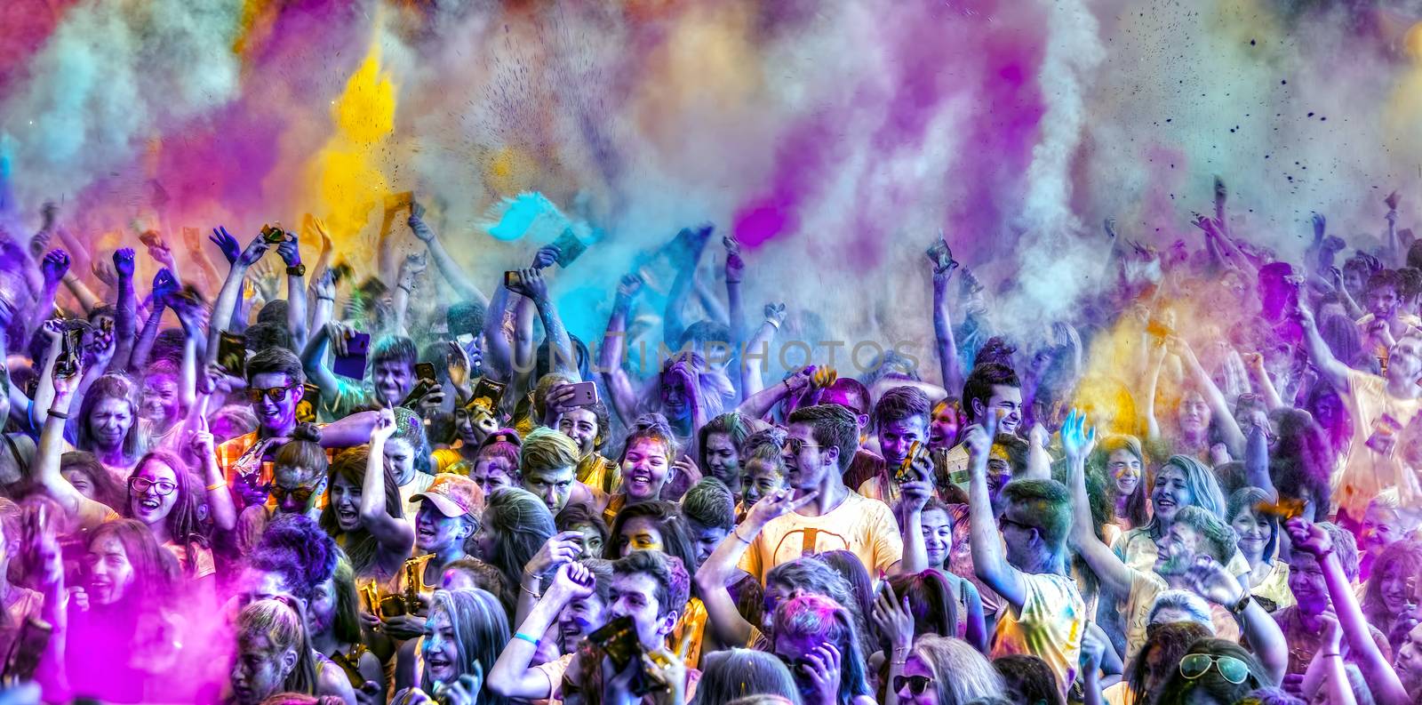 Ruse city, Bulgaria - June 28, 2017. Happy young people dancing and celebrating during Music and Colors festival, close view, infraed filter