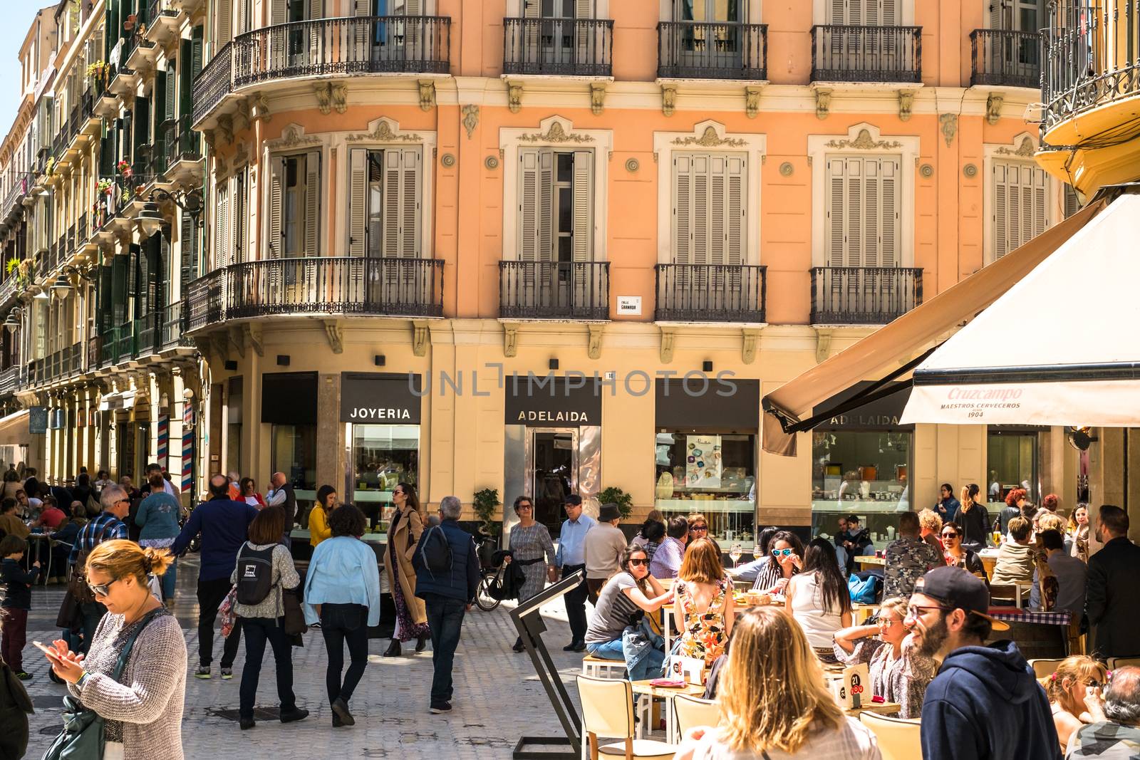 Malaga, Spain - April 14, 2018. Old street around the historic center with tourist, Malaga city, Spain