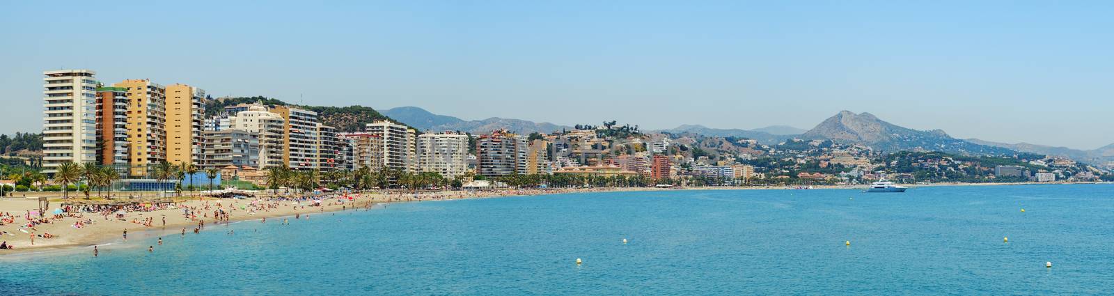 Malaga, Spain - June 26, 2018. Panoramic view over the Malagueta beach on a clear day, Malaga city, Costa del Sol, Malaga Province, Andalucia, Spain, Western Europe