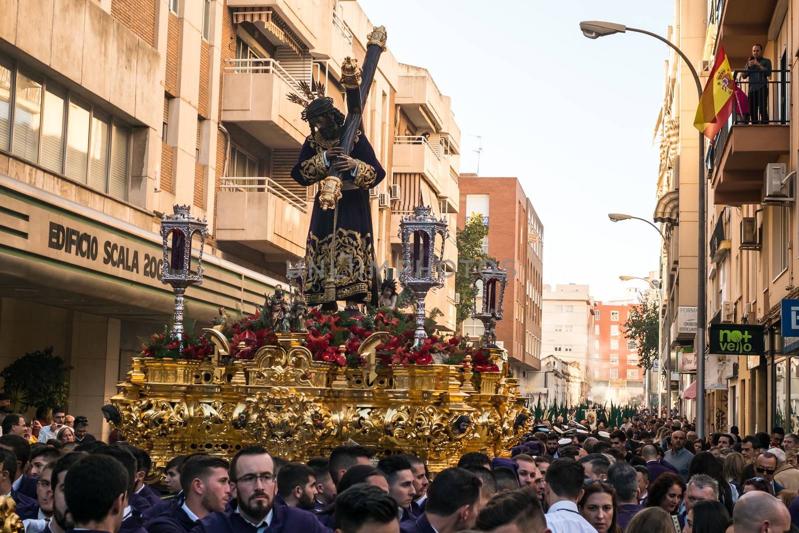 Malaga, Spain - March 27, 2018. People participating in the procession in the Holy Week in a Spanish city