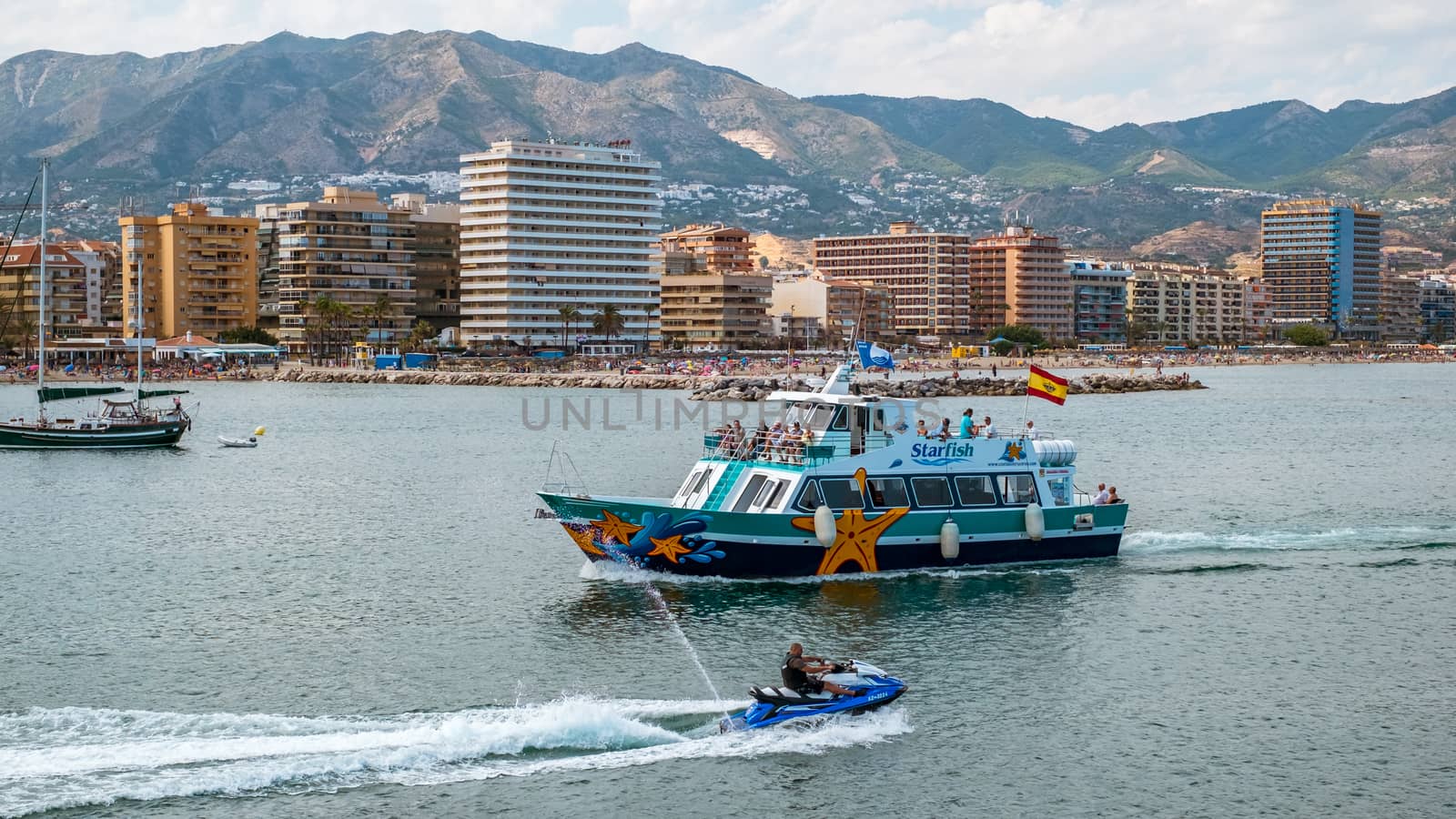 Fuengirola, Spain - June 31, 2018. pleasure boats at sea in the bay, Fuengirola city, Costa del sol, Spain