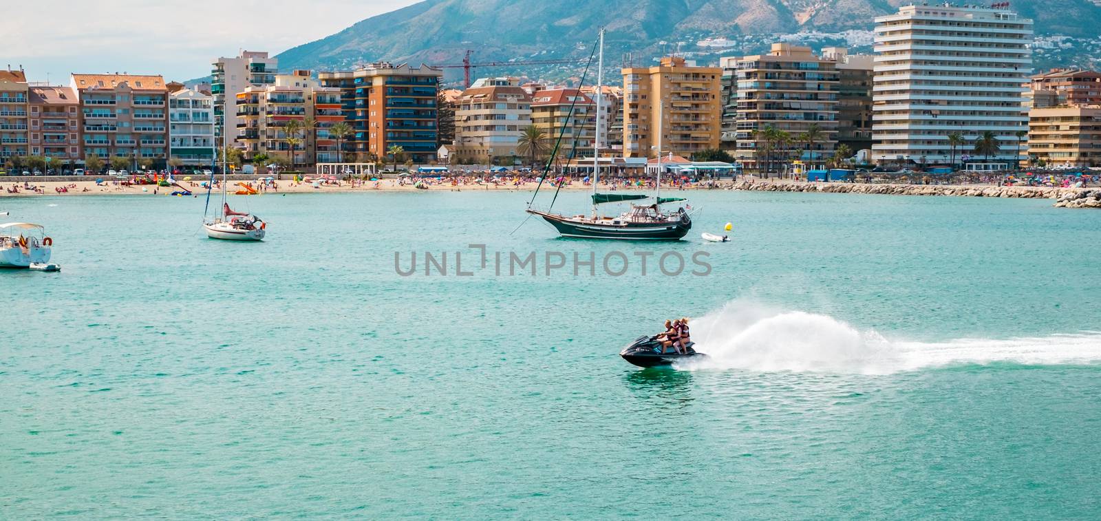 Fuengirola, Spain - June 31, 2018. pleasure boats at sea in the bay, Fuengirola city, Costa del sol, Spain