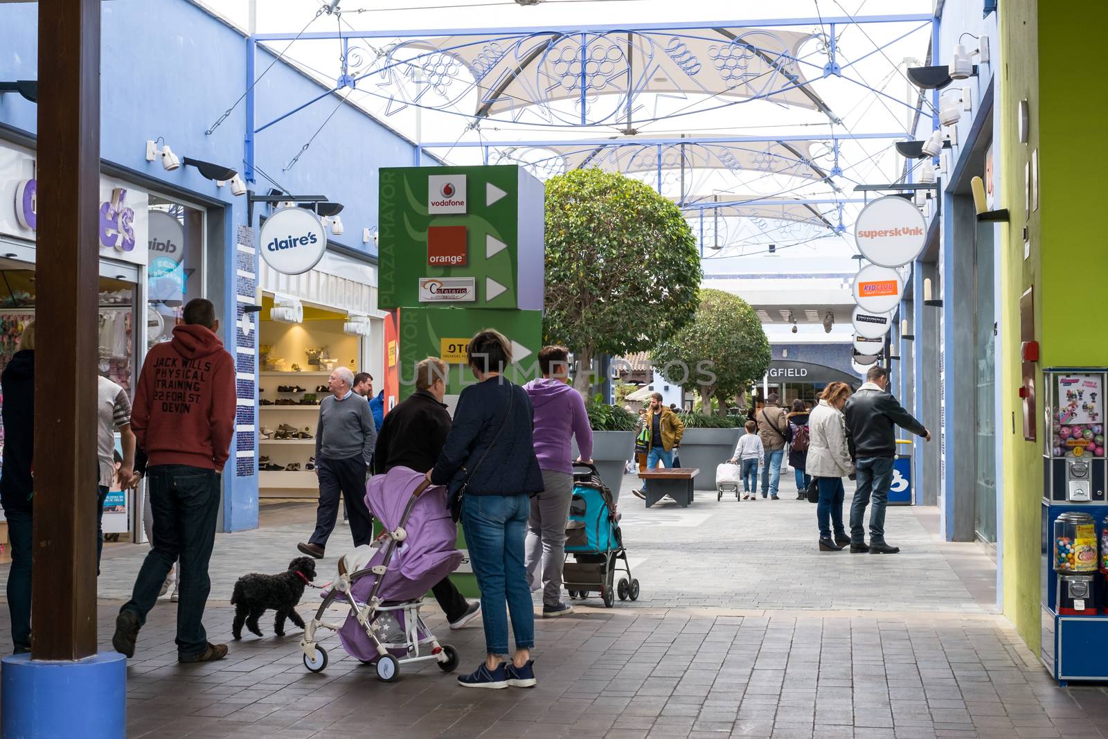 Malaga, Spain - April 07, 2018. shopping people at the Plaza Mayor mall Malaga, Spain