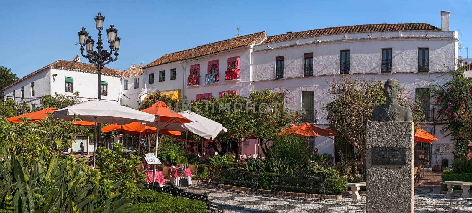 Marbella, Spain - August 26th, 2018. Orange Square, The Plaza de los Naranjos in the old town of Marbella, Spain. The plaza dates from 1485.