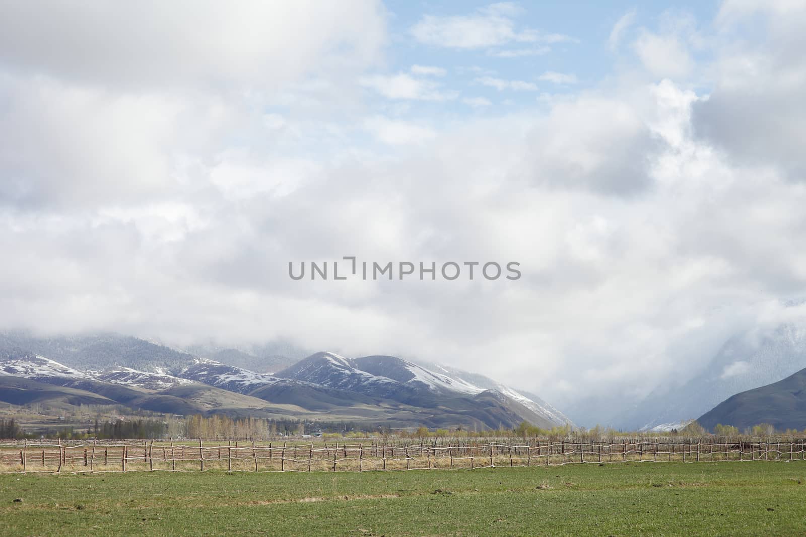 Beautiful mountain landscape. Wildlife Kyrgyzstan. Clouds in the sky. Kyrgyzstan. High quality photo