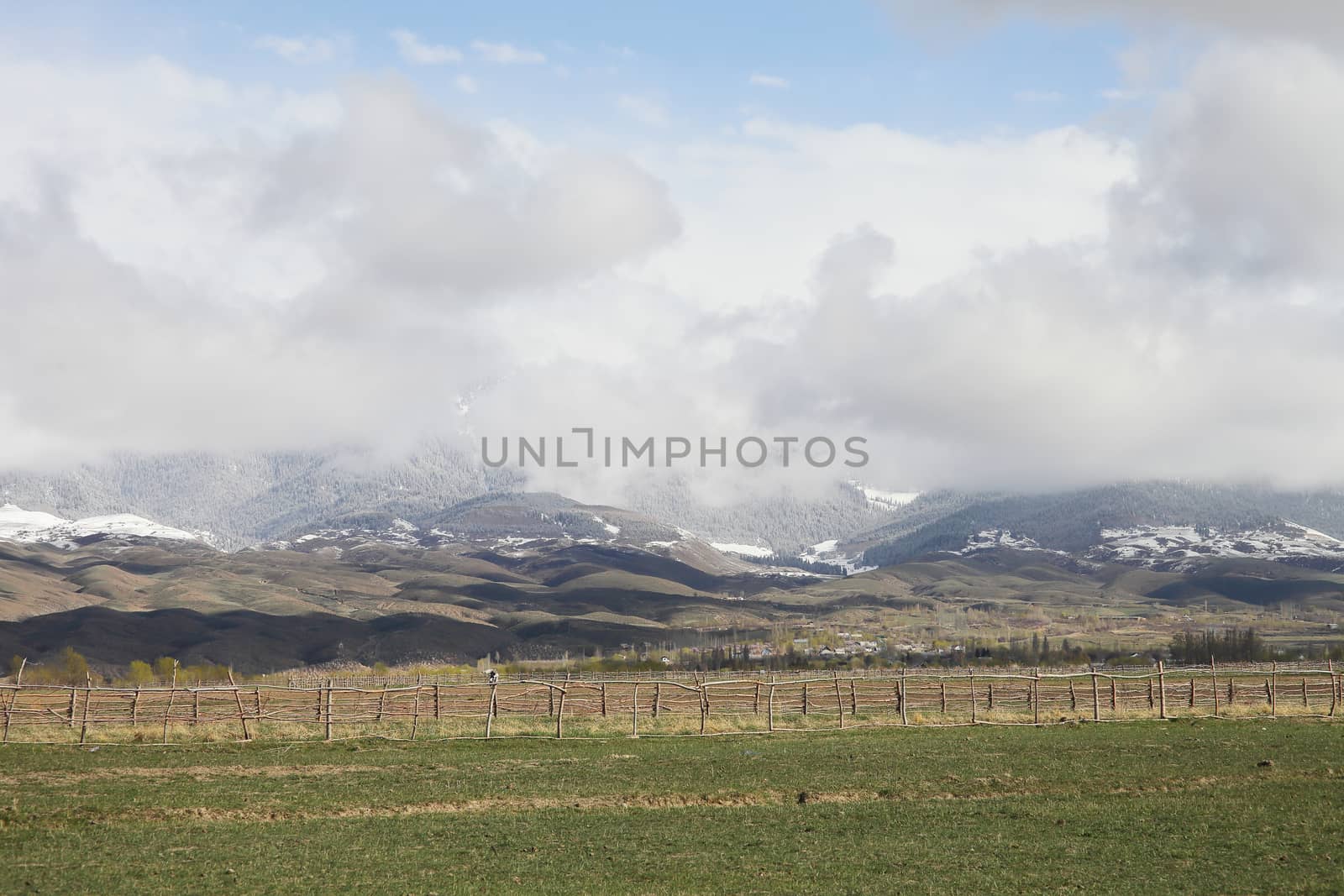 Beautiful mountain landscape. Wildlife Kyrgyzstan. Clouds in the sky. Kyrgyzstan. High quality photo