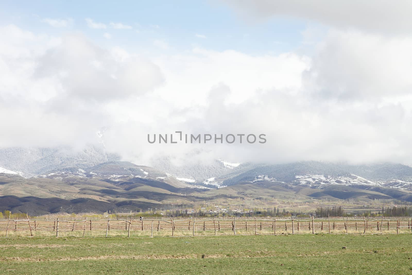 Beautiful mountain landscape. Wildlife Kyrgyzstan. Clouds in the sky. Kyrgyzstan by selinsmo