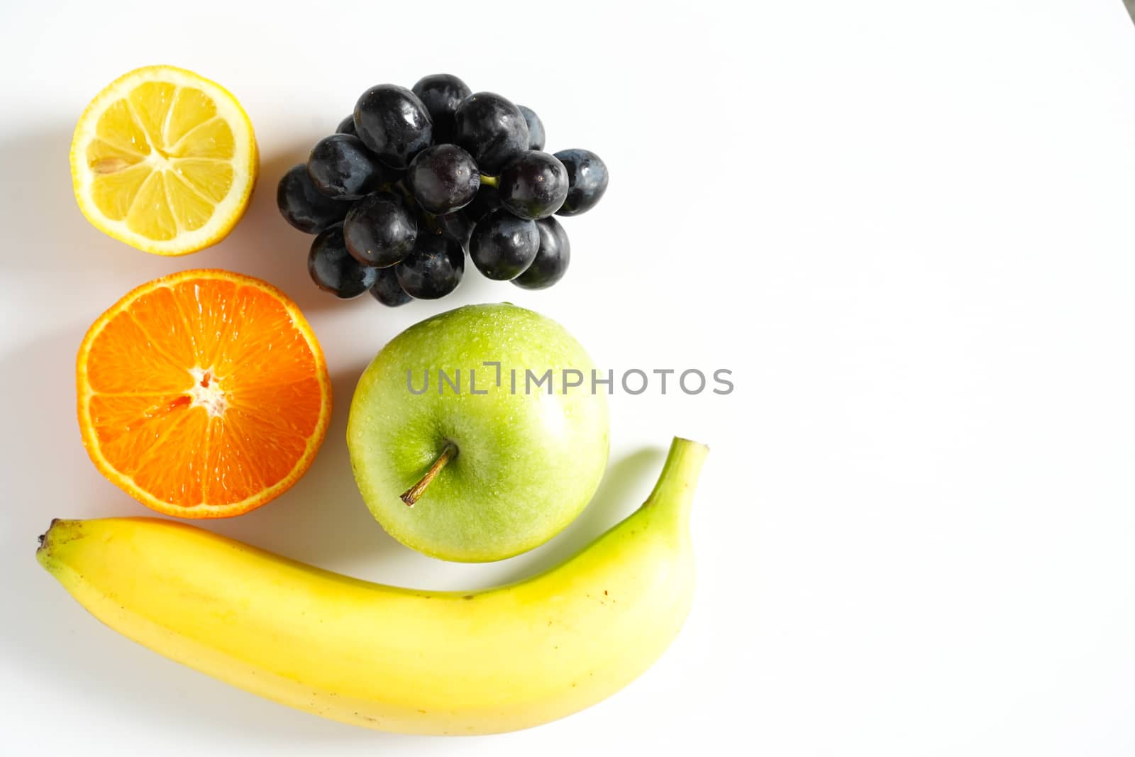 A selection of tropical fruit against a plain white background