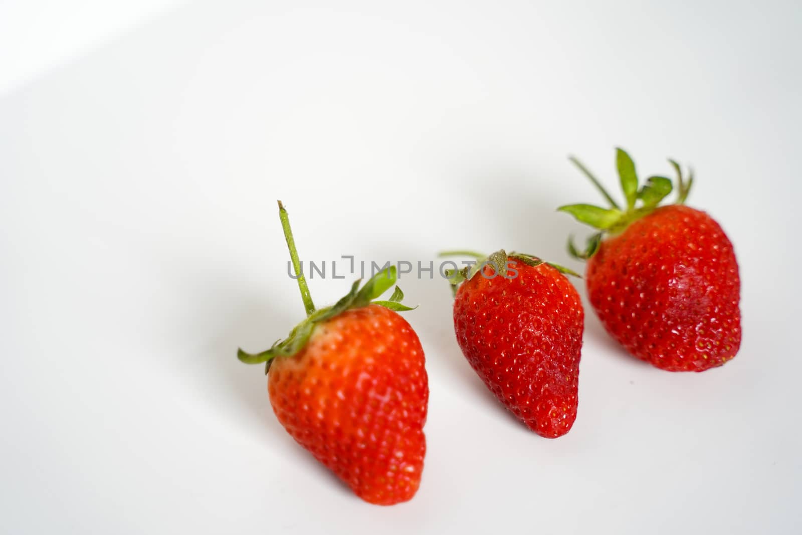 Three Whole Strawberries by samULvisuals