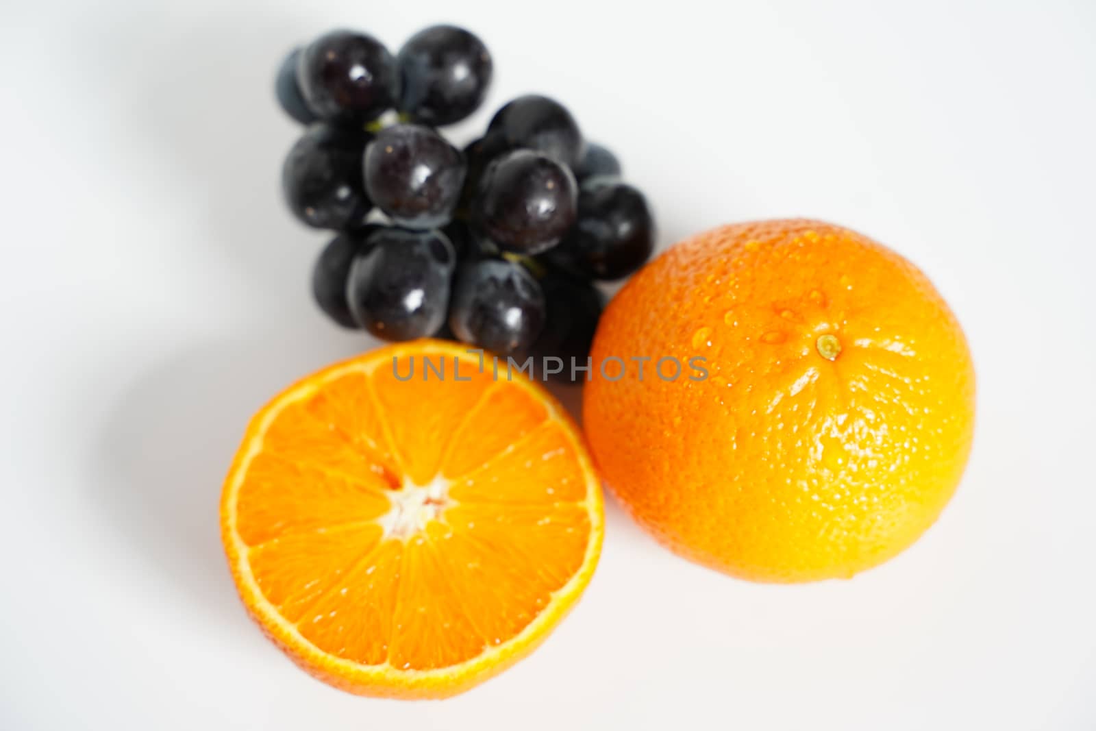 Orange and Grapes by samULvisuals