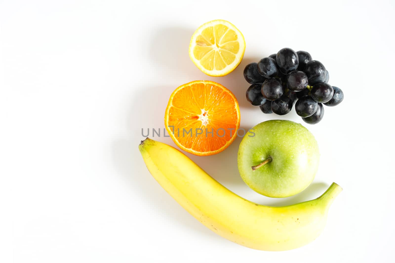 A selection of tropical fruit against a plain white background