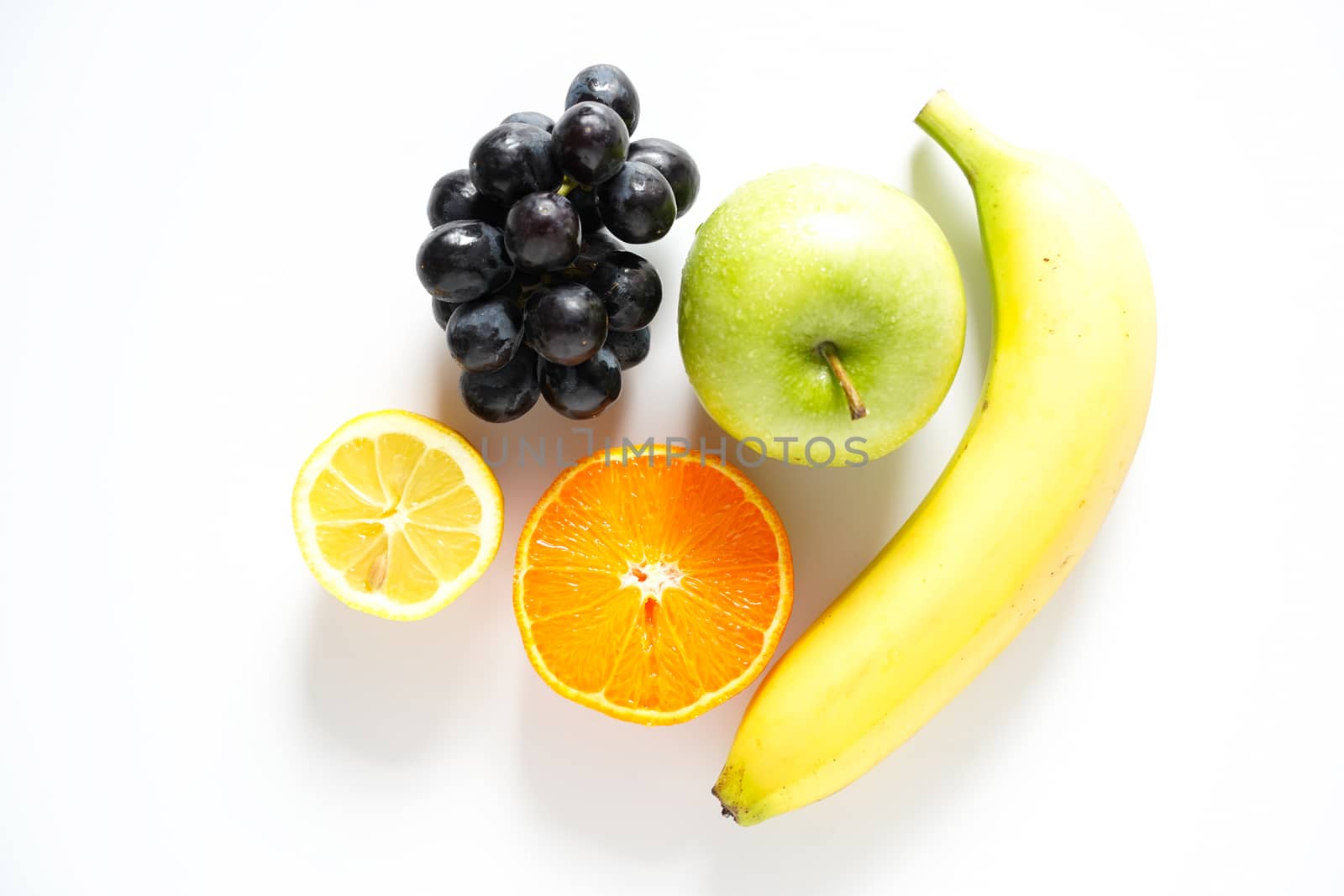 A selection of tropical fruit against a plain white background