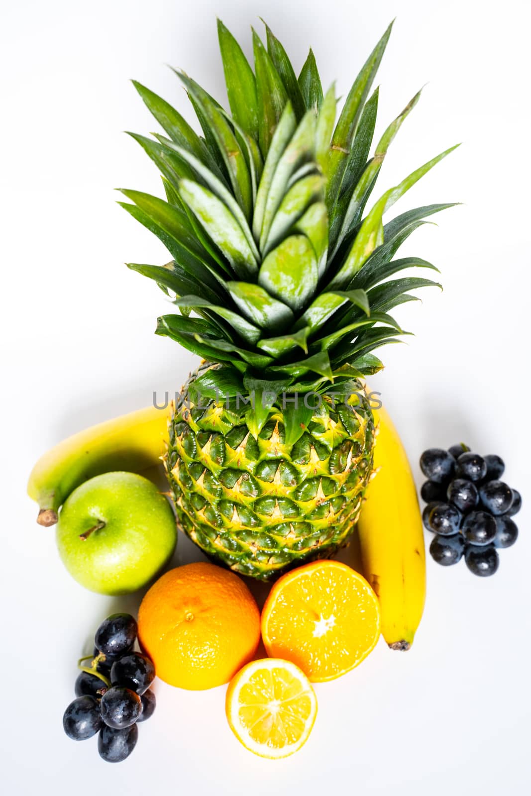 A selection of tropical fruit against a plain white background