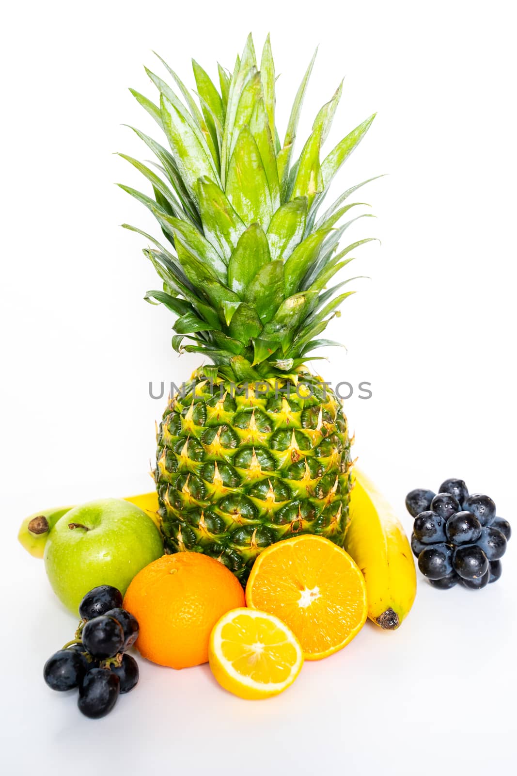 A selection of tropical fruit against a plain white background