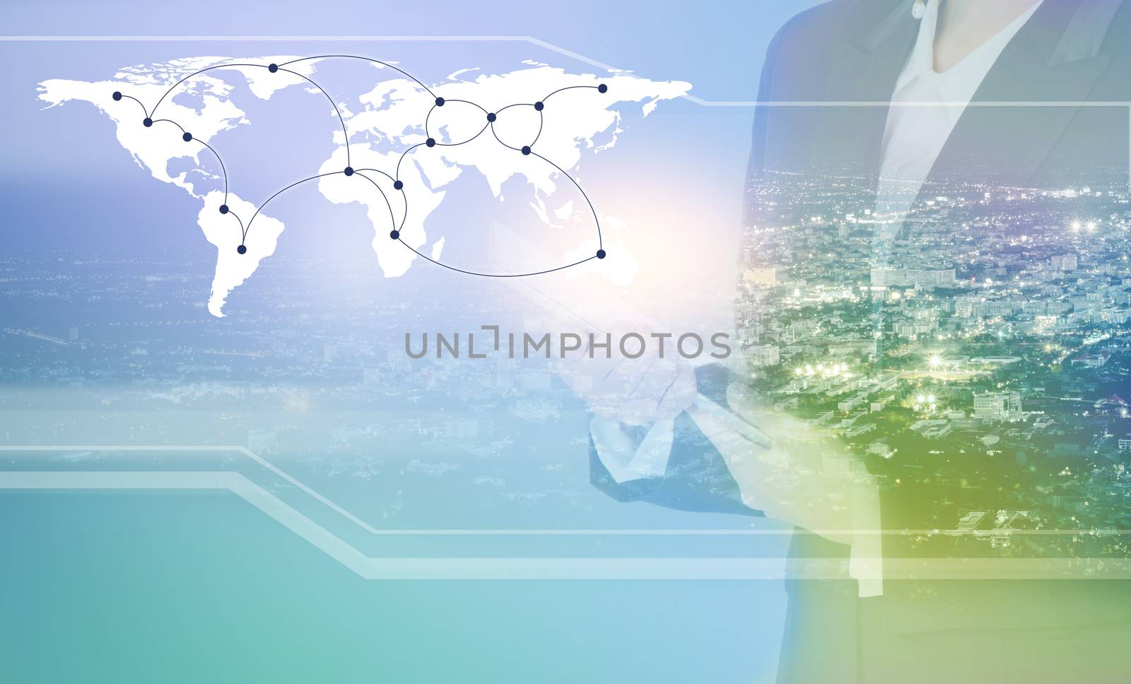 Double exposure of businesswoman using tablet for connection with city and network communication on building background, Elements of this image furnished by NASA