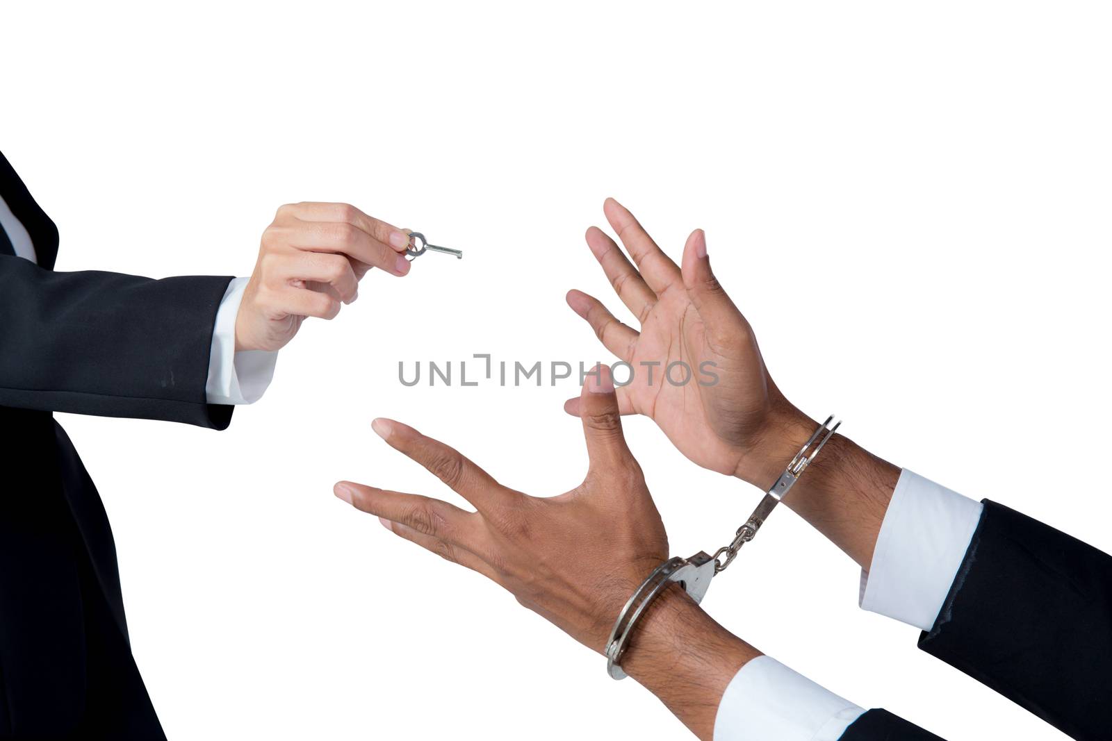 businessman in handcuffs and woman hand offering key solving business ideas concept isolated on white background