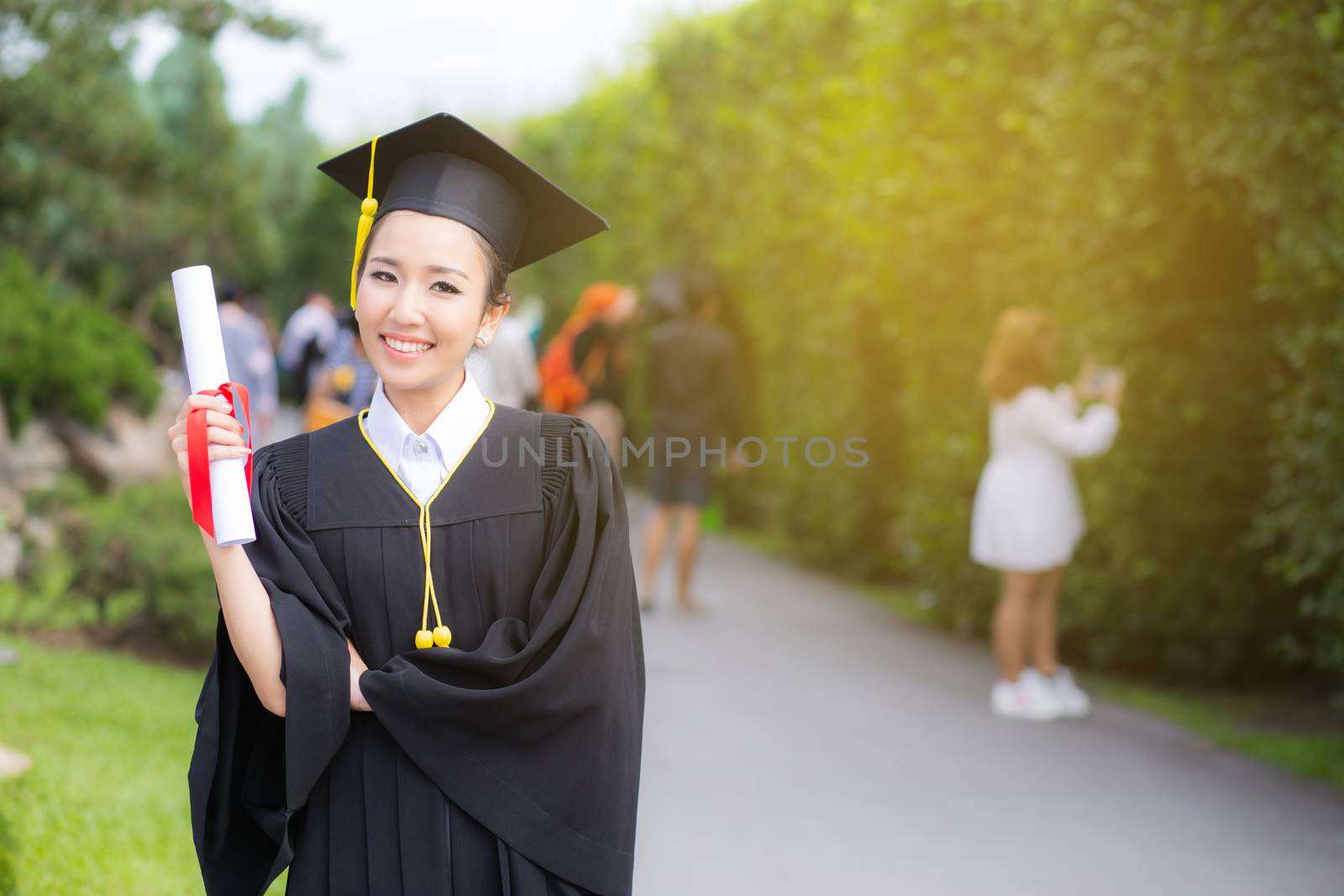 Happy graduated student girl, congratulations - graduate educati by nnudoo