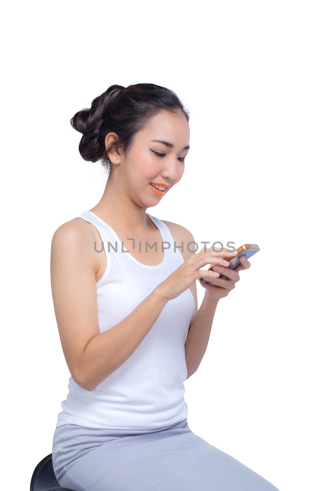 Beautiful Asian woman holding blank screen smartphone on white background