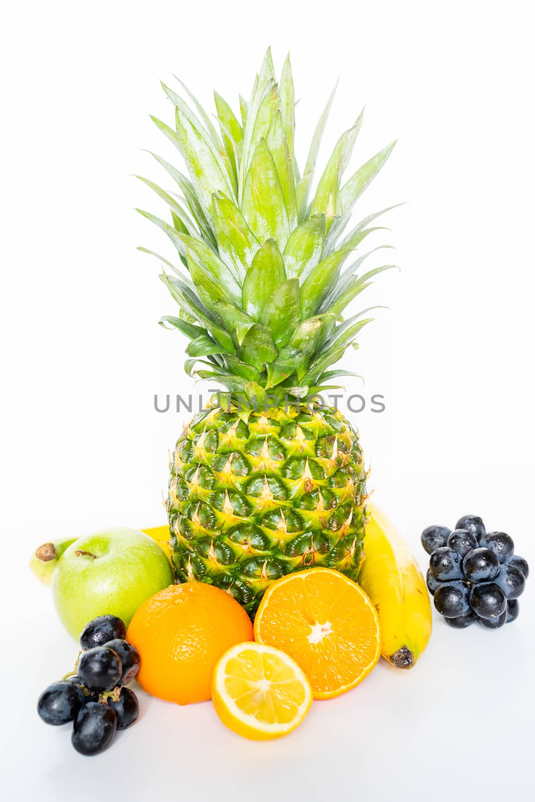 A selection of tropical fruit against a plain white background