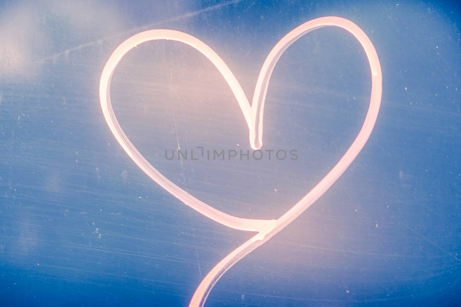 Red Spray Paint Heart on a road sign