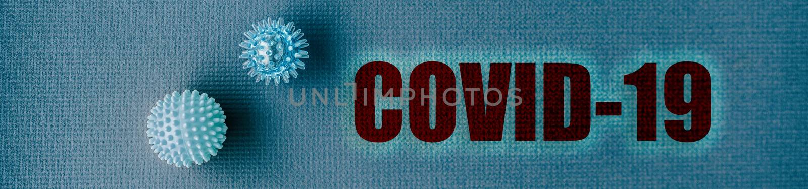 COVID-19 name of Novel Coronavirus from Wuhan, China. Header panoramic background of name text title with blue spheres concept by Maridav