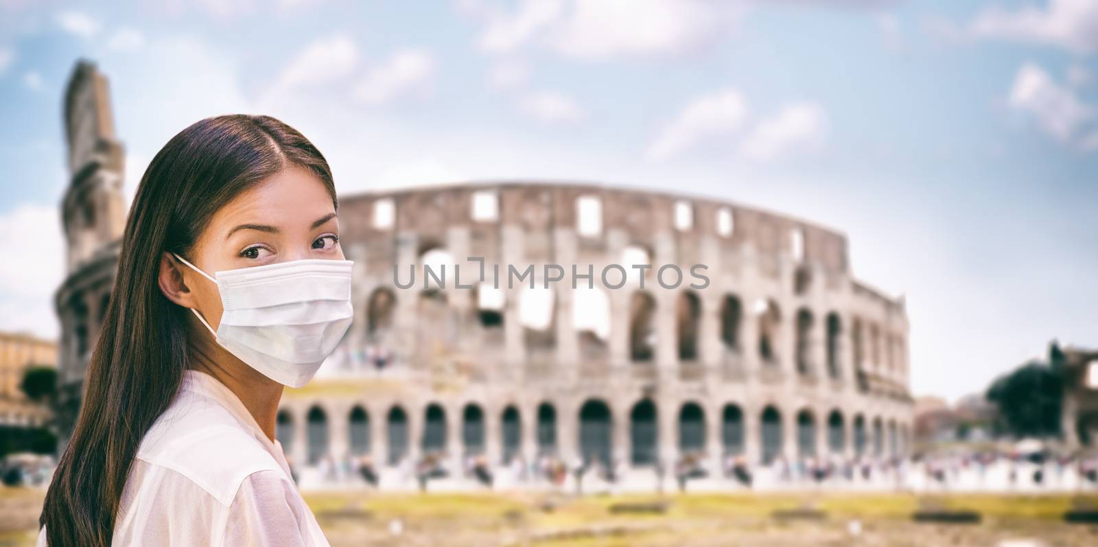 Corona virus Italy travel tourist chinese woman wearing surgical mask protection for coronavirus visiting colosseum landmark in Roma, Italy. Travel ban quarantine italian destinations banner panorama by Maridav