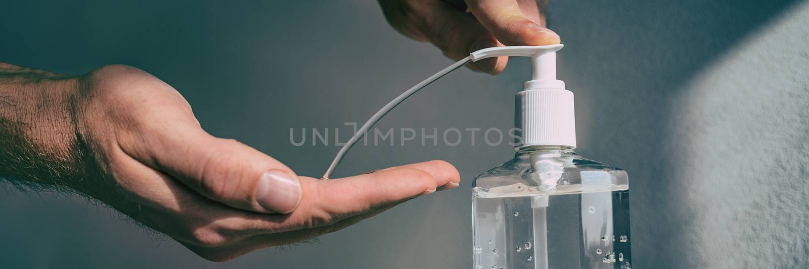 Hand sanitizer alcohol gel rub cleaning hands for hygiene prevention of coronavirus virus pandemic banner panoramic header by Maridav