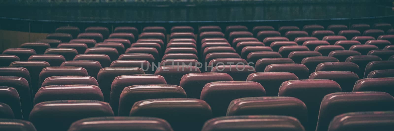 Coronavirus closure of public spaces such as cinemas, theatres, city lockdown. Retail businesses shut down. Banner panoramic background of empty concert seats.