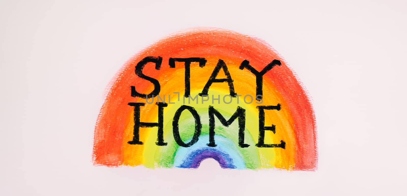 COVID-19 banner Coronavirus staying at home message sign with text "STAY HOME" written over rainbow child panting viral social media message for social distancing awareness. Flatten the curve by Maridav