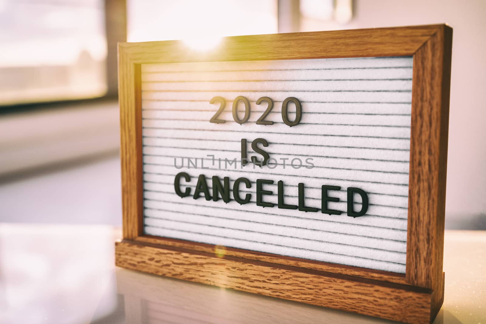 COVID-19 Coronavirus Quote 2020 IS CANCELLED written on white felt letter board sign. Funny message for public events, outdoor gatherings by Maridav