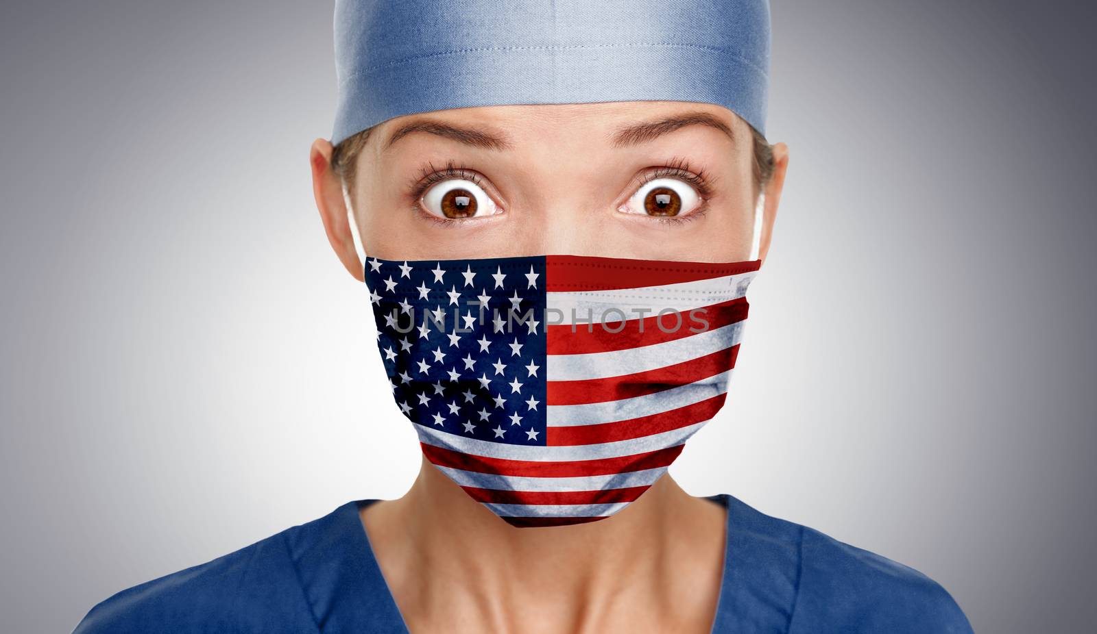 Asian American doctor shocked for COVID-19 crisis help with USA flag on surgical mask. Healthcare workers needing PPE help to fight COVID-19 Coronavirus .