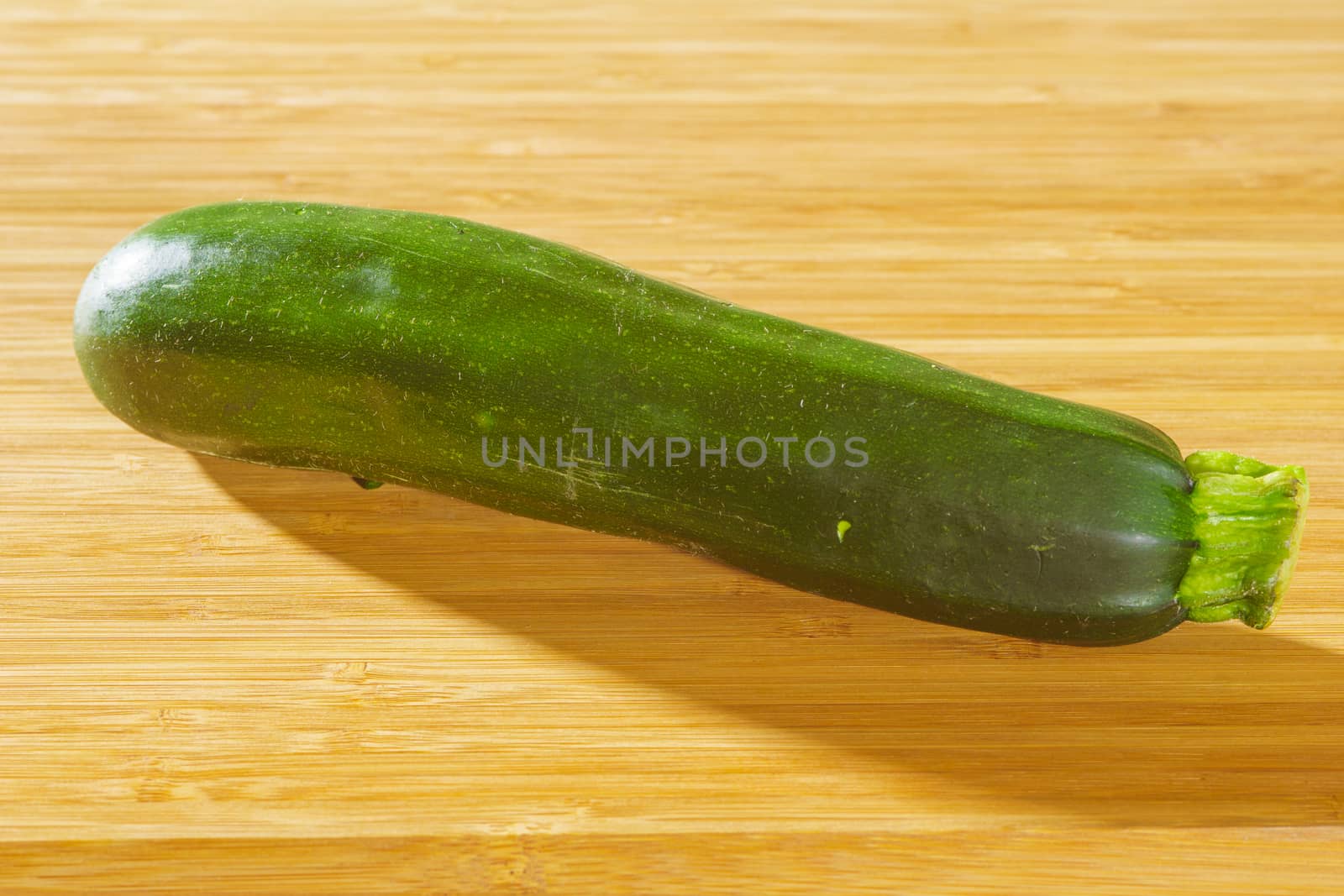 Zucchini on a wooden background