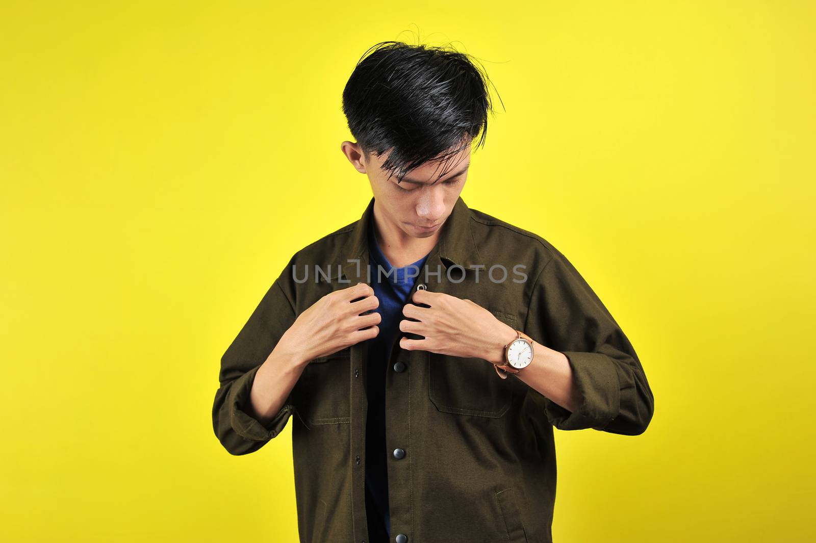 Confidence Asian young man wear casual t-shirts and jacket by heruan1507